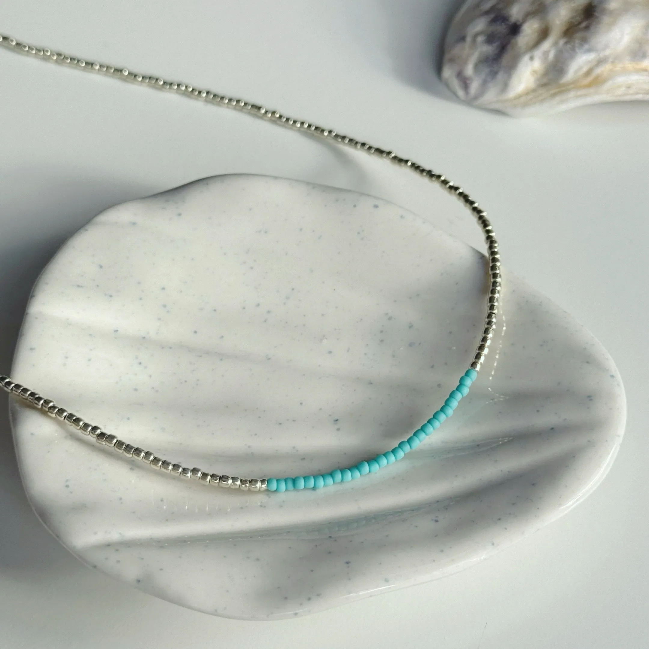 Gold and ocean blue necklaces