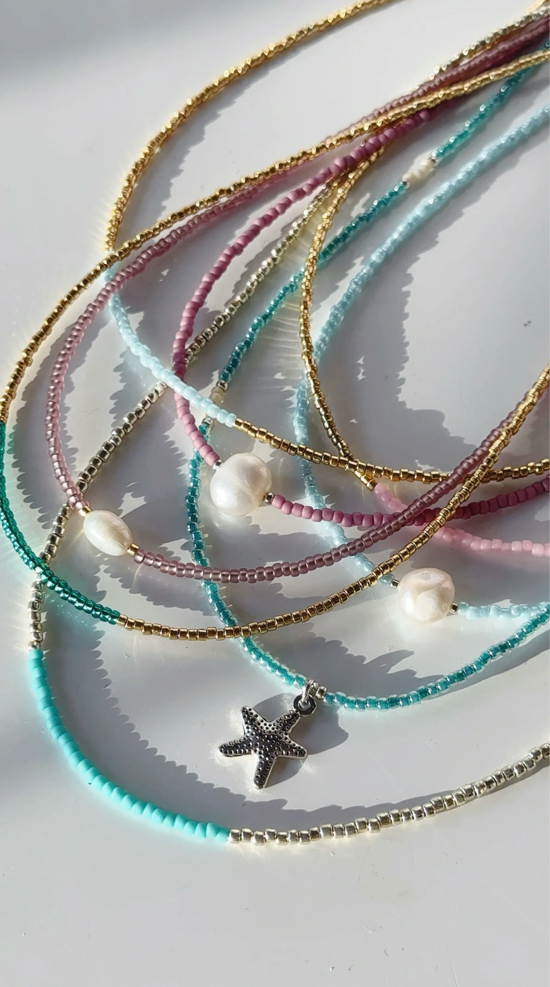 Gold and ocean blue necklaces