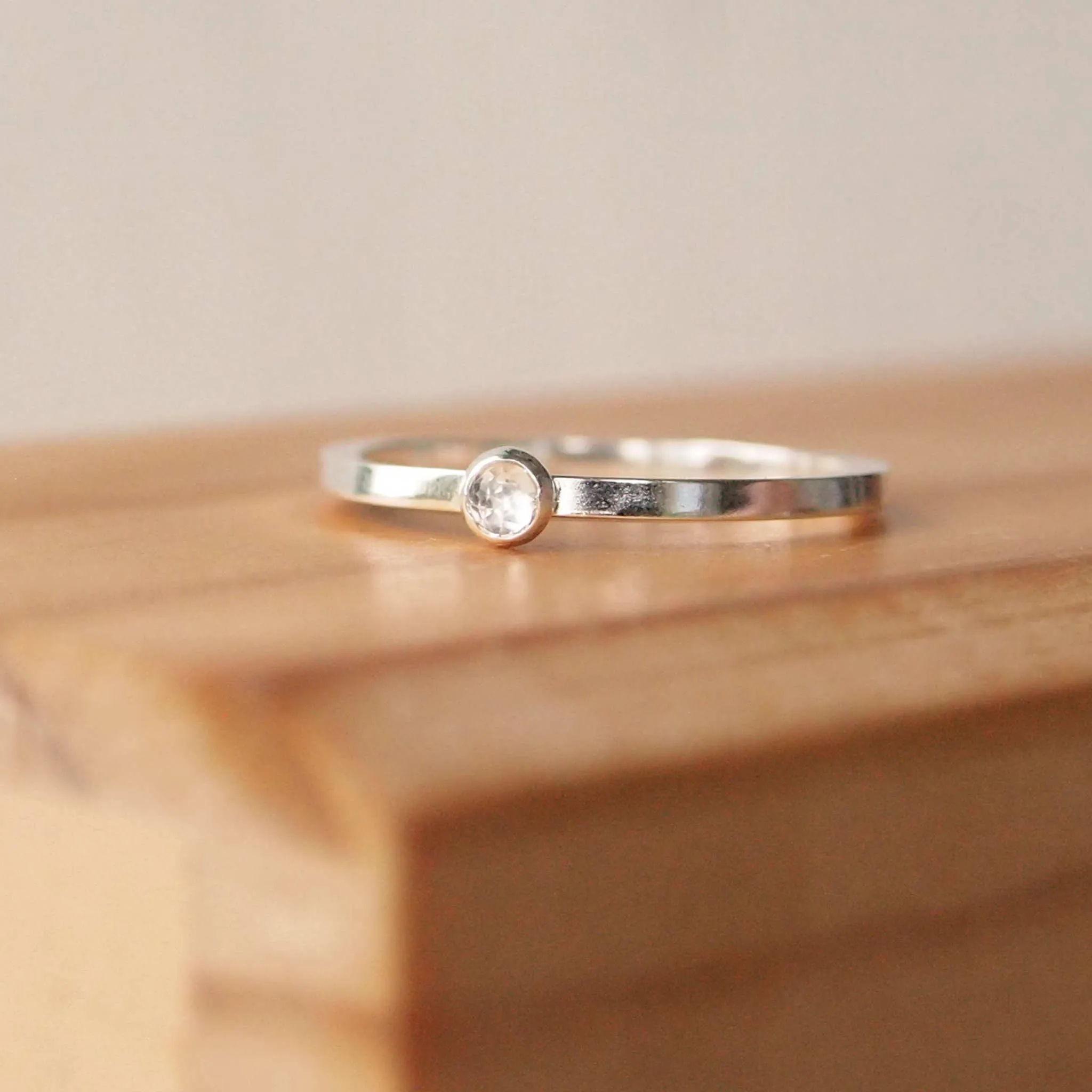 White Topaz Ring: Round Band with 3mm Stone
